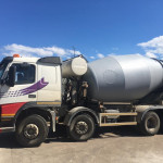 Concrete truck mixer on urban construction project
