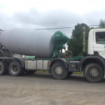 Side view of truck mixer showing drum rotation