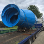 Delivery of a mixing drum on a flatbed, Cookstown