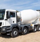 Concrete truck mixer on gravel yard